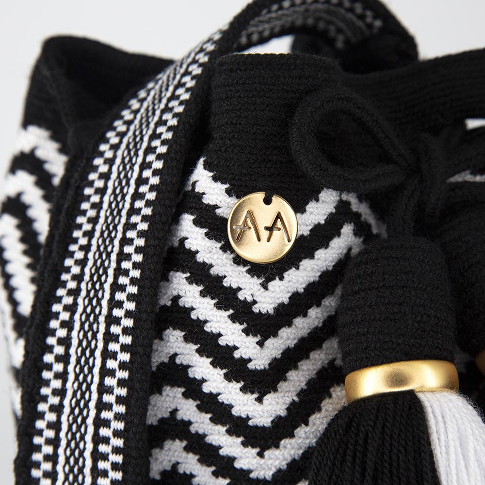 Olas Small crossbody bucket bag in Black/White