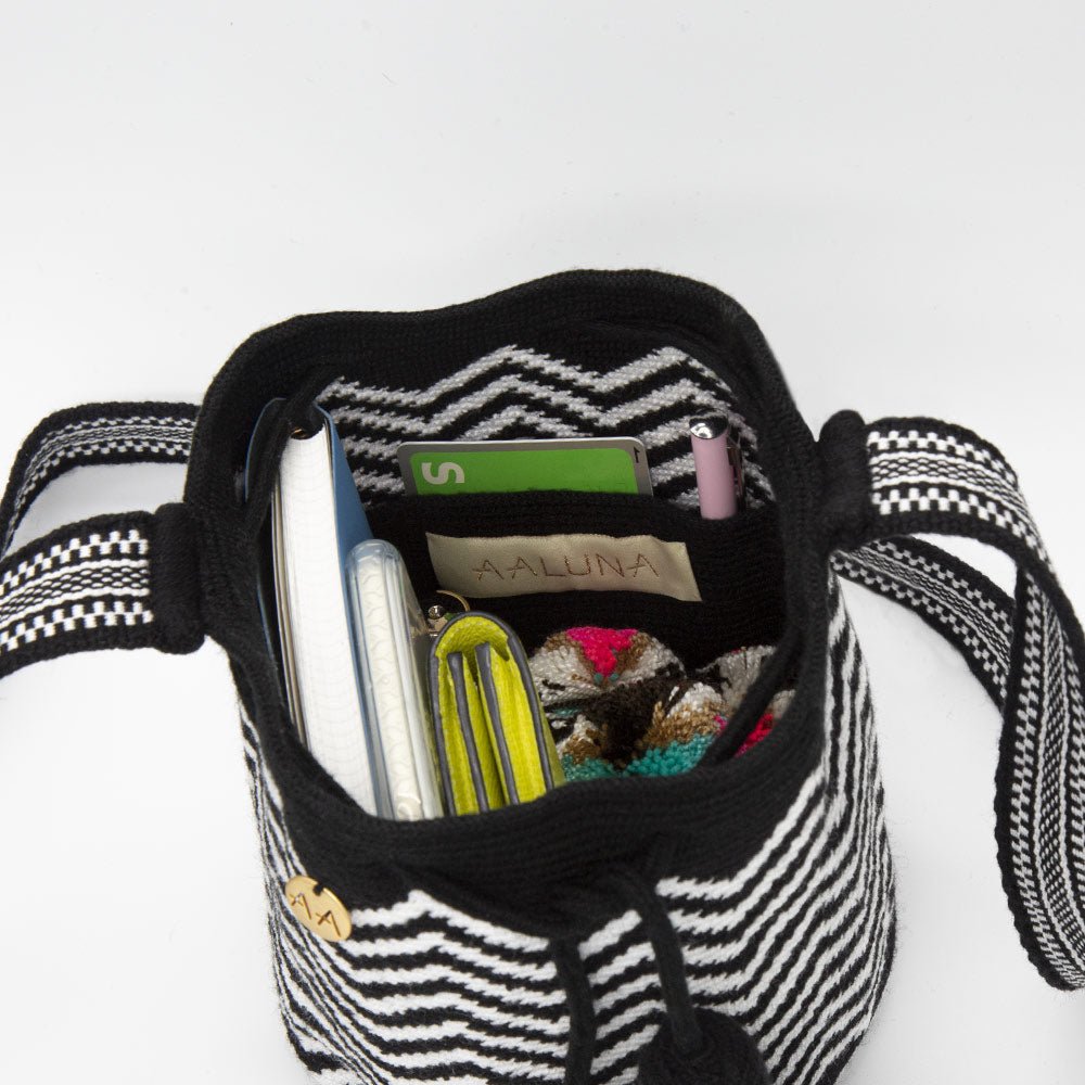 Olas Small crossbody bucket bag in Black/White